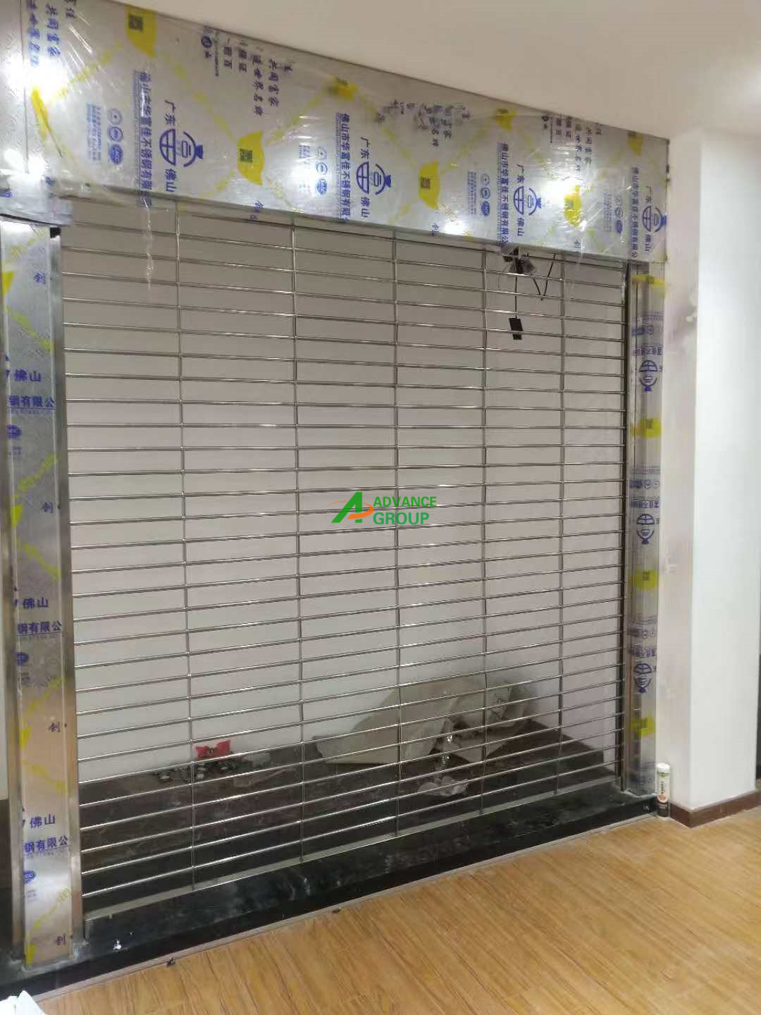 Stainless steel grille roll up door